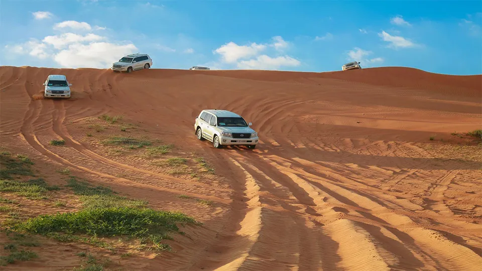 Desert Safari in RAK: Dune Bashing, Sand Boarding and a Camel Ride - Image 1