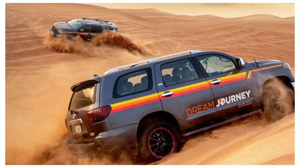 Dubai Desert Discovery: Red Dunes Safari, Sandboard &#038; Camel Ride - Image 1